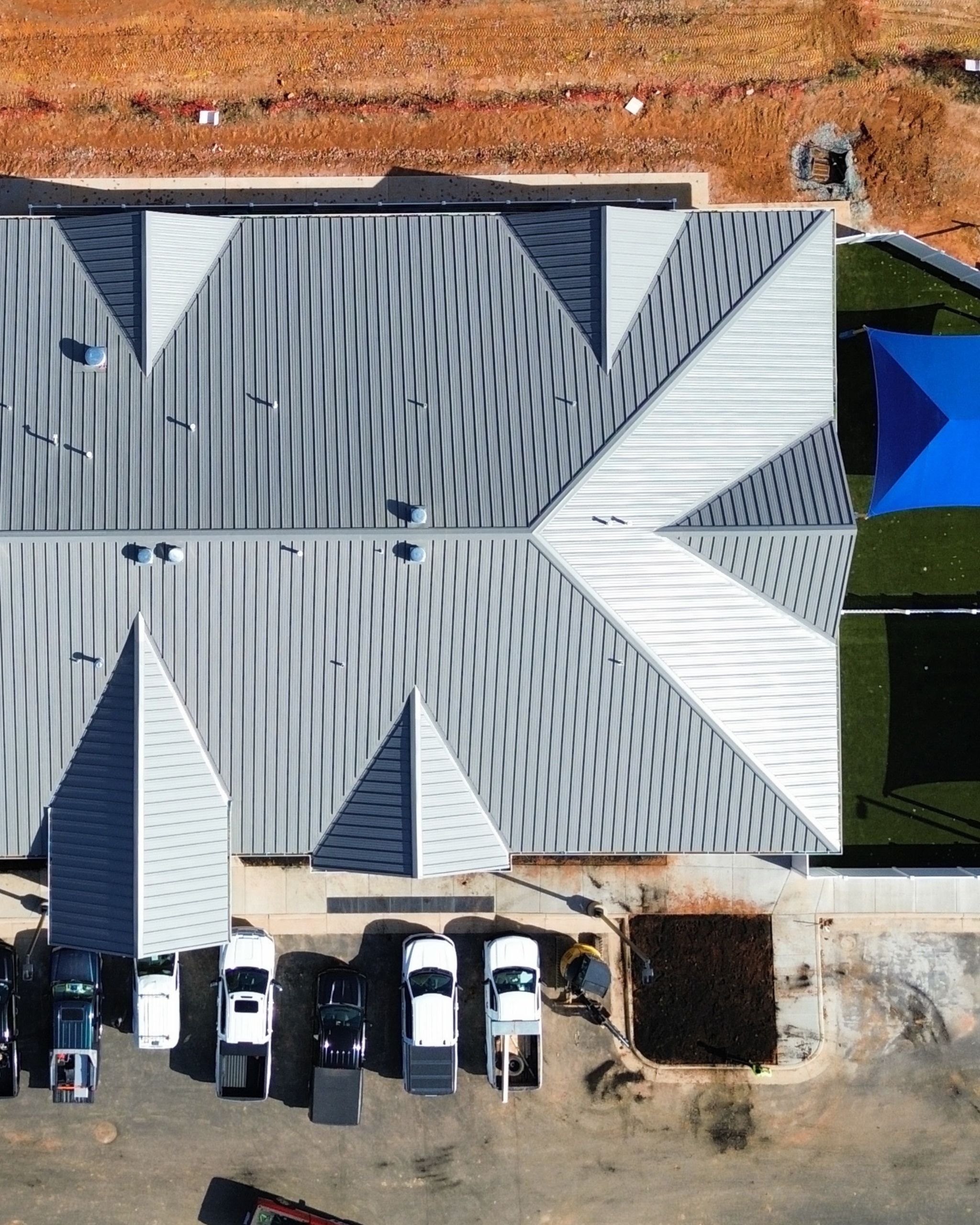 CUSTOM METAL ROOF DESIGNS